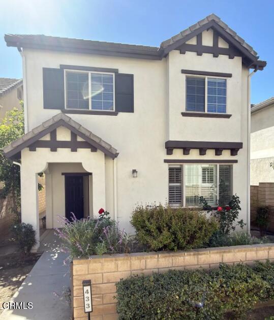 433 Merced Court Corona, CA 92878 - Photo 1 of 22 a front view of a house with garden