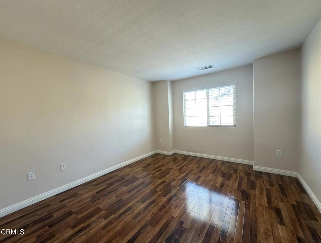 433 Merced Court Corona, CA 92878 - Photo 11 of 22 a view of an empty room and window