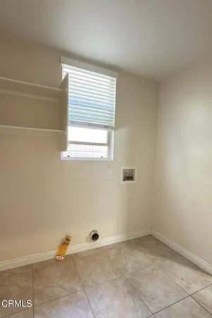 a view of a room with a window