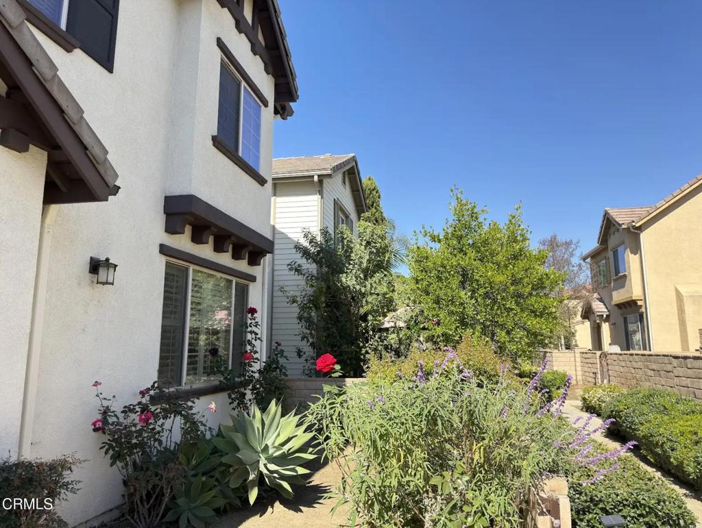 433 Merced Court Corona, CA 92878 - Photo 2 of 22 a flower plants in front of a building