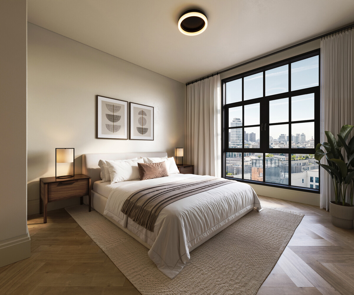402 Union Avenue, Unit 1 Brooklyn, NY 11211 - Photo 5 of 9 a spacious bedroom with a large bed and a large window