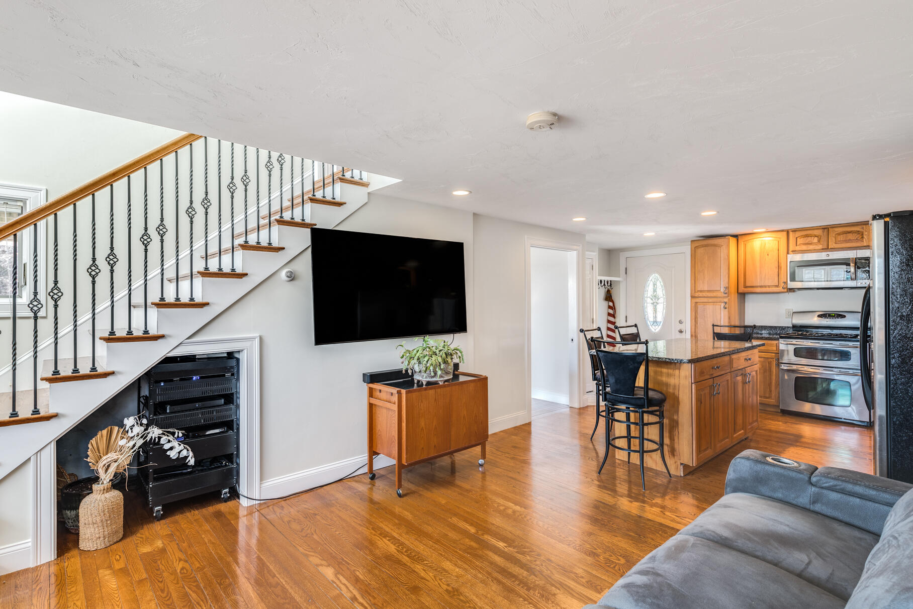 704 State Highway Eastham, MA 02642 - Photo 12 of 26 a living room with furniture and a flat screen tv