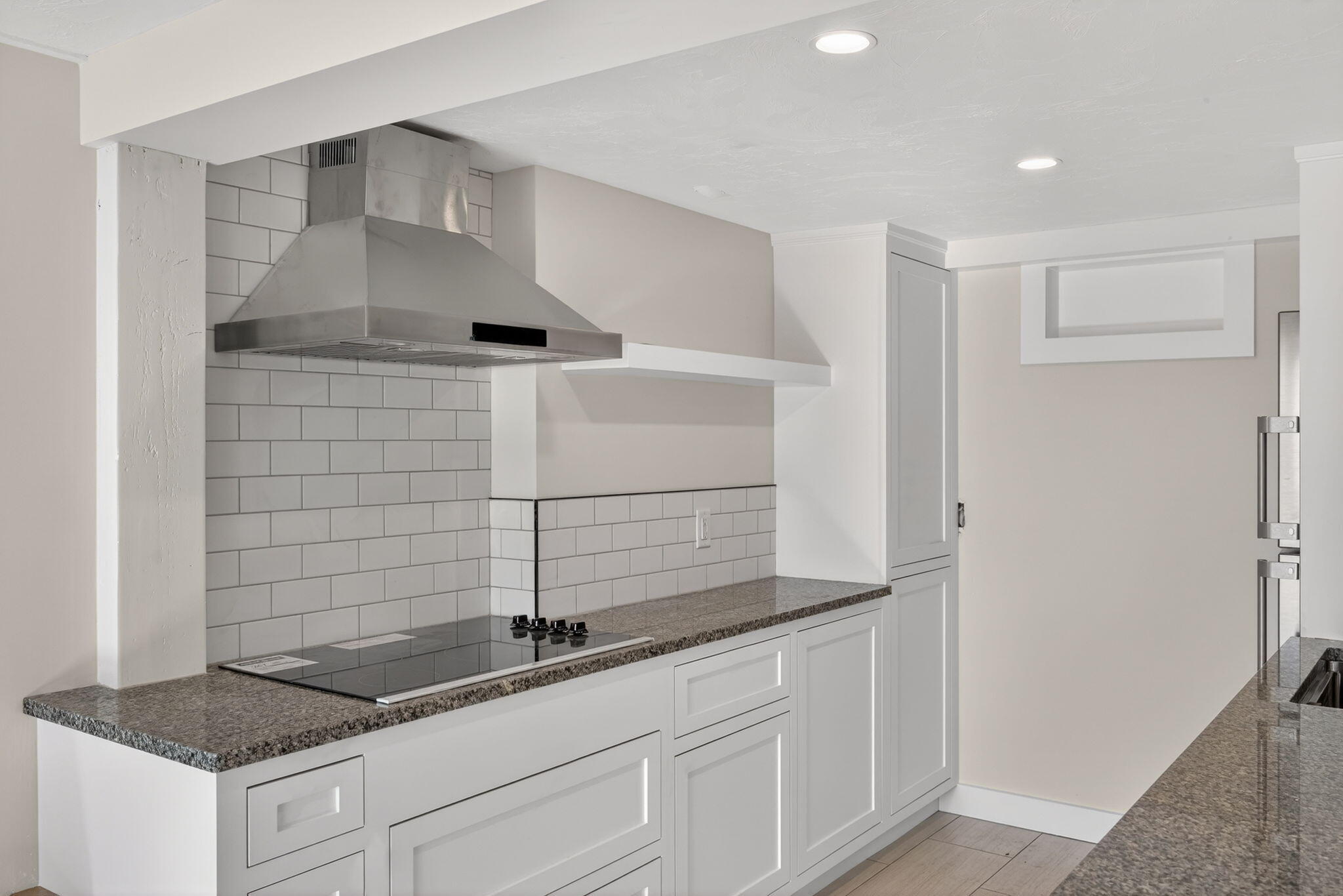 704 State Highway Eastham, MA 02642 - Photo 16 of 26 a bathroom with a granite countertop sink and a mirror