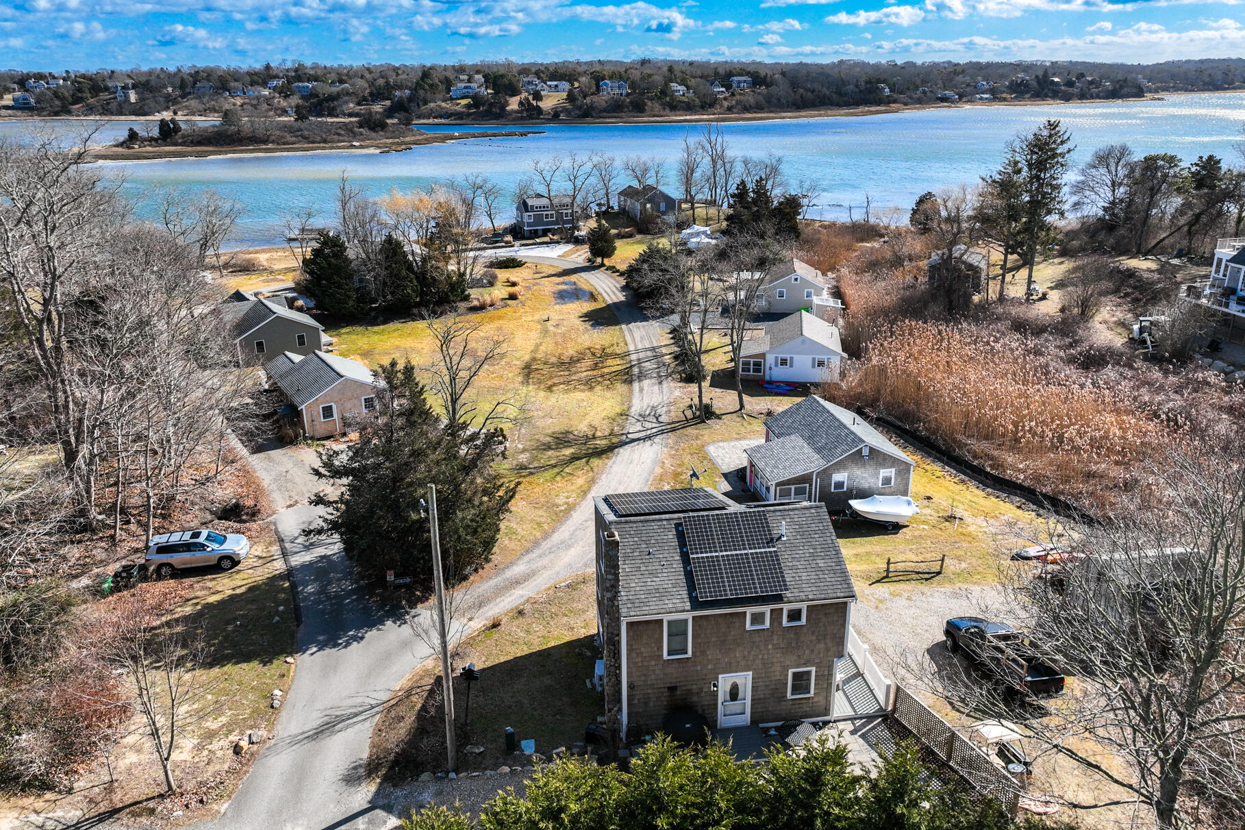 704 State Highway Eastham, MA 02642 - Photo 20 of 26 a view of a lake with houses