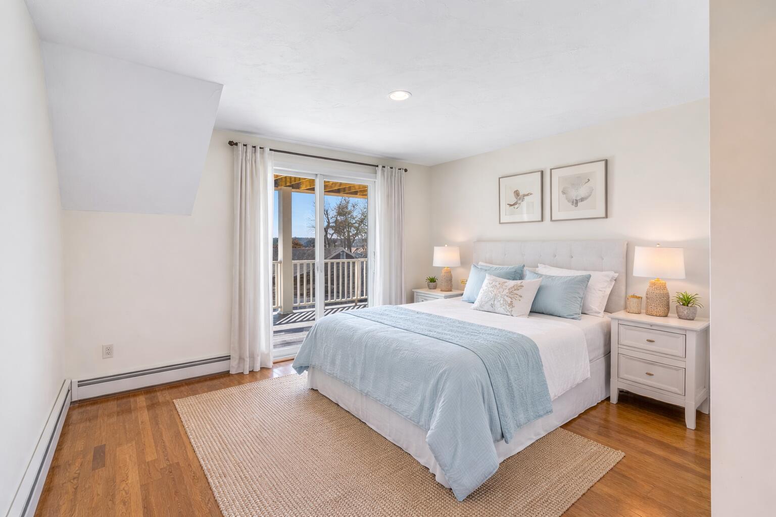 704 State Highway Eastham, MA 02642 - Photo 10 of 26 a bedroom with a bed and a window