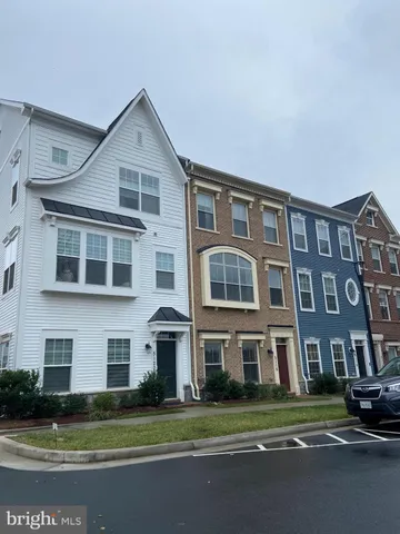 a front view of a building with yard