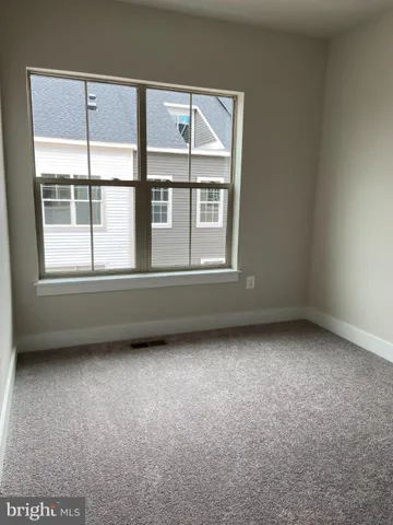 a bathroom with a sink toilet a mirror and shower