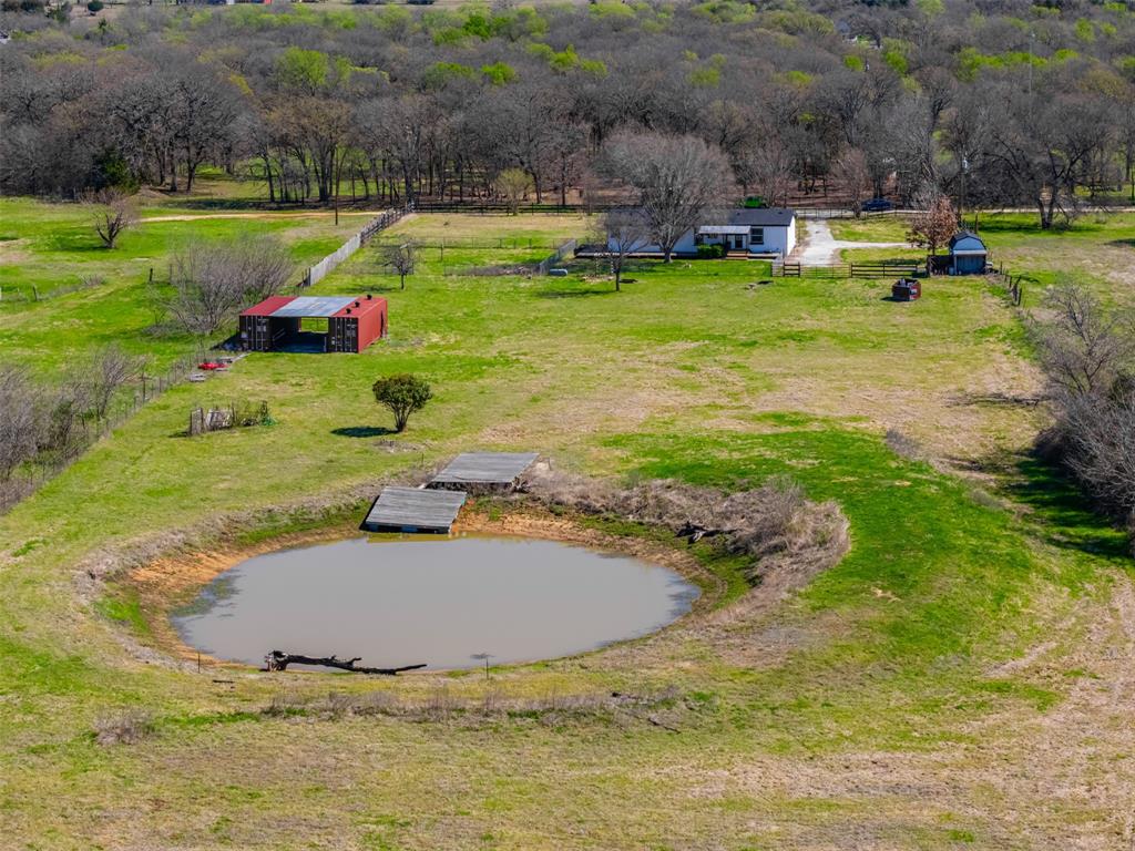 181 Pr 125 Whitney, TX 76692 - Photo 30 of 34 Private pond with floating dock and deck on 13 acre retreat in Whitney Texas