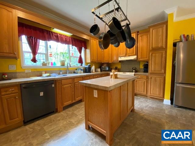 404 Rocky Road Stanardsville, VA 22973 - Photo 11 of 33 a kitchen with a sink a counter top space and stainless steel appliances