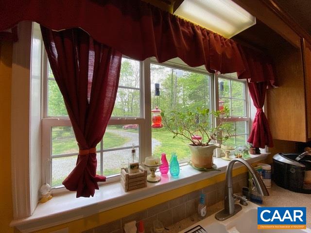 404 Rocky Road Stanardsville, VA 22973 - Photo 12 of 33 a room with furniture and a large window