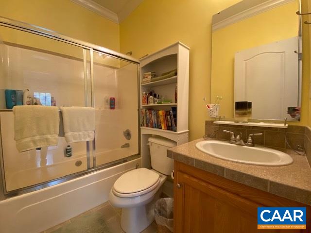 404 Rocky Road Stanardsville, VA 22973 - Photo 19 of 33 a bathroom with a sink a toilet and shower