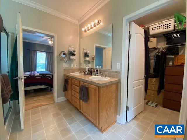 404 Rocky Road Stanardsville, VA 22973 - Photo 25 of 33 a spacious bathroom with a sink a mirror and a shower