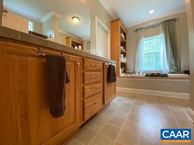 404 Rocky Road Stanardsville, VA 22973 - Photo 26 of 33 a bathroom with a bathtub and a shower