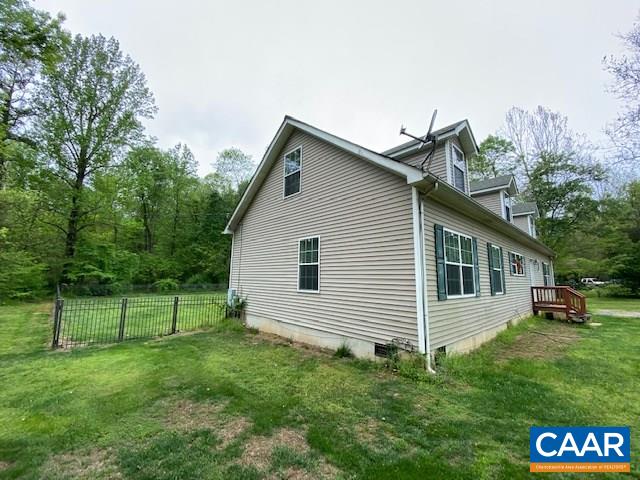 404 Rocky Road Stanardsville, VA 22973 - Photo 30 of 33 a view of a house with a yard