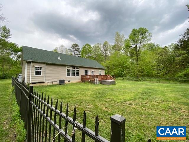 404 Rocky Road Stanardsville, VA 22973 - Photo 31 of 33 a view of a house with backyard and a garden