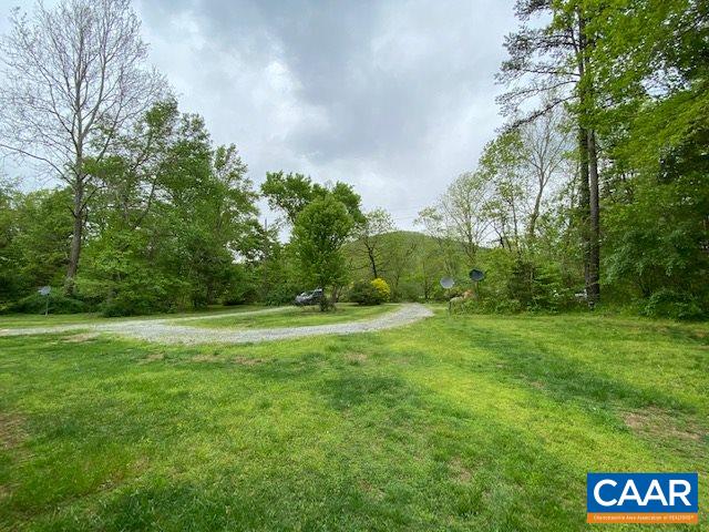 404 Rocky Road Stanardsville, VA 22973 - Photo 32 of 33 a view of grassy field with trees
