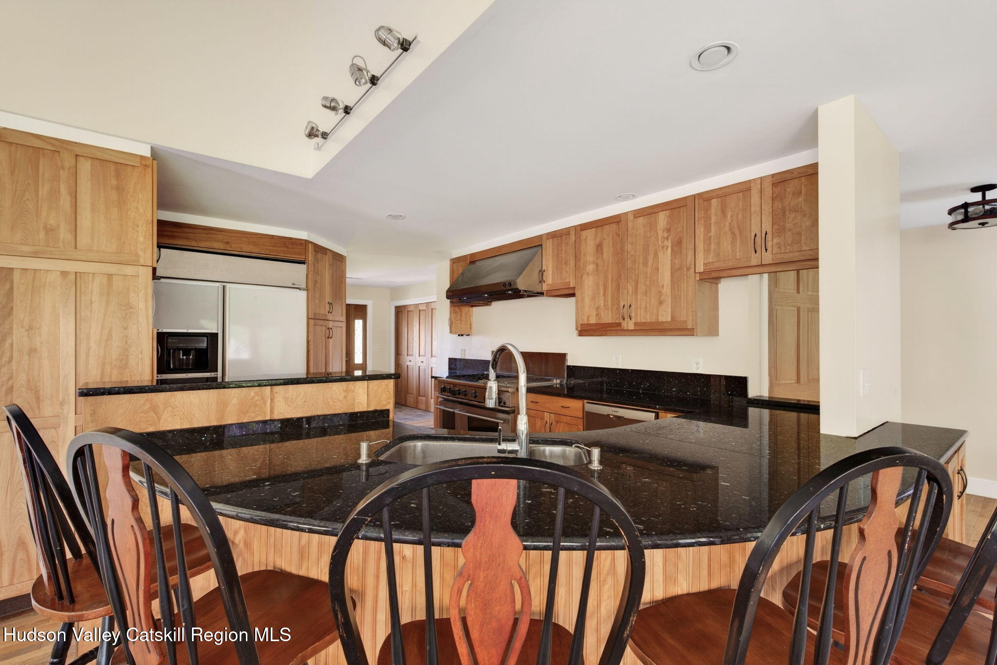 86 Paul Horn Road Catskill, NY 12414 - Photo 17 of 56 a table and chairs in a room