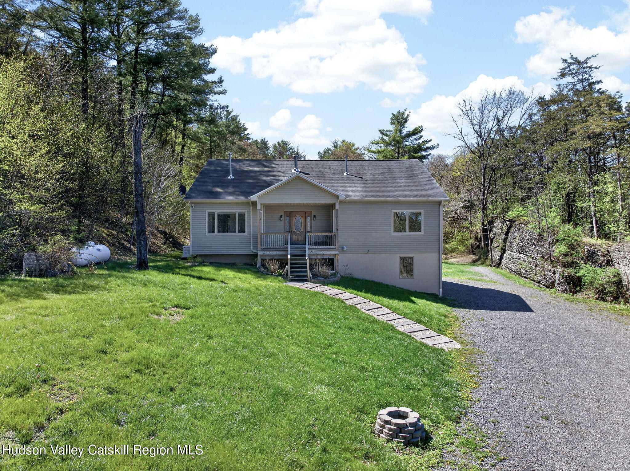 86 Paul Horn Road Catskill, NY 12414 - Photo 2 of 56 front view of a house with a yard