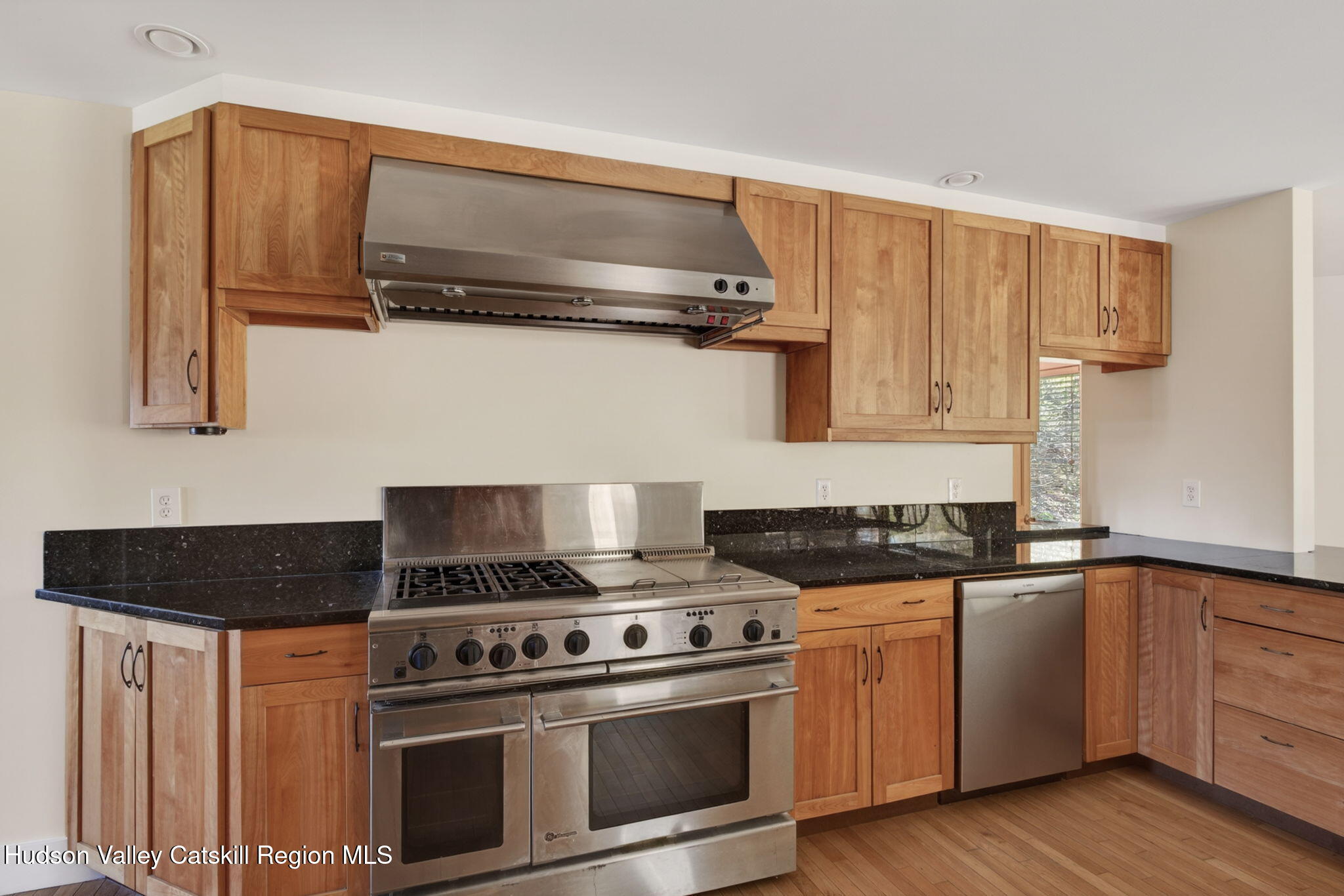 86 Paul Horn Road Catskill, NY 12414 - Photo 20 of 56 a kitchen with granite countertop a stove and a sink