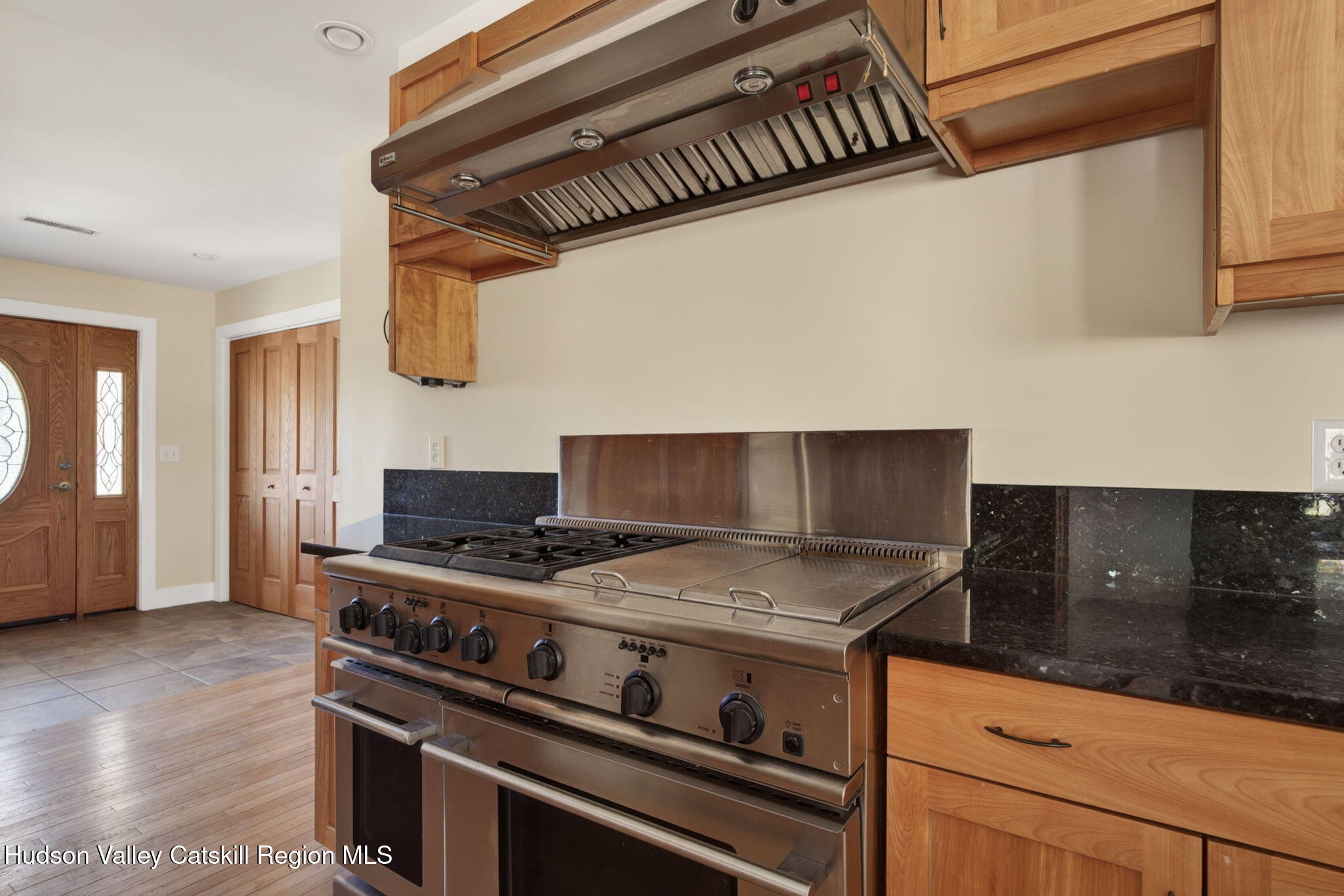 86 Paul Horn Road Catskill, NY 12414 - Photo 21 of 56 a kitchen with granite countertop a stove and a sink