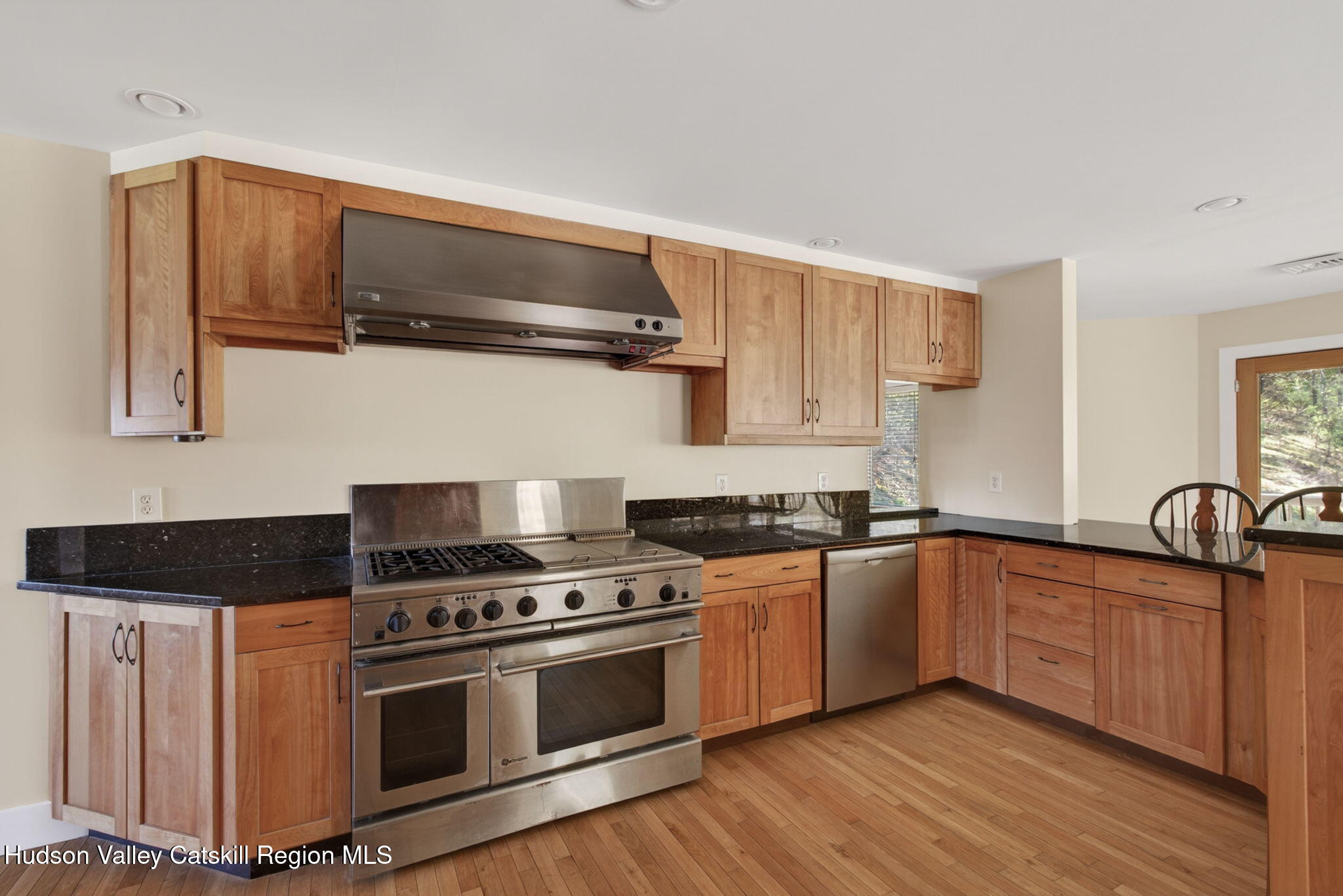 86 Paul Horn Road Catskill, NY 12414 - Photo 3 of 56 a kitchen with stainless steel appliances granite countertop a stove and a sink