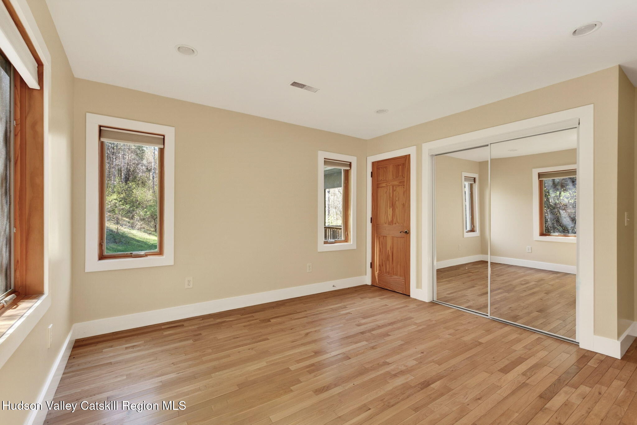 86 Paul Horn Road Catskill, NY 12414 - Photo 37 of 56 a view of empty room with wooden floor and fan