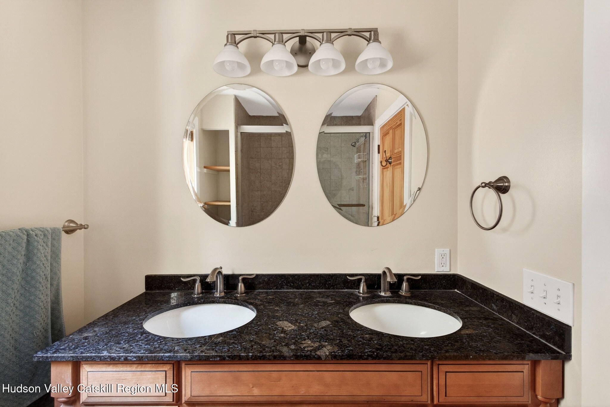 86 Paul Horn Road Catskill, NY 12414 - Photo 38 of 56 a bathroom with sinks and a mirror