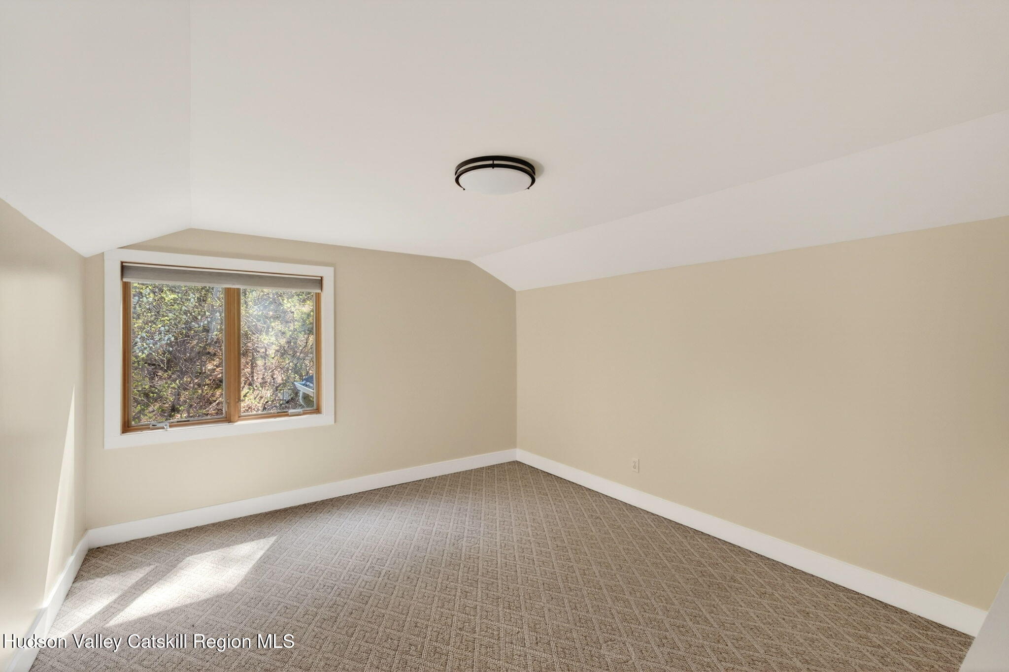 86 Paul Horn Road Catskill, NY 12414 - Photo 41 of 56 an empty room with a window