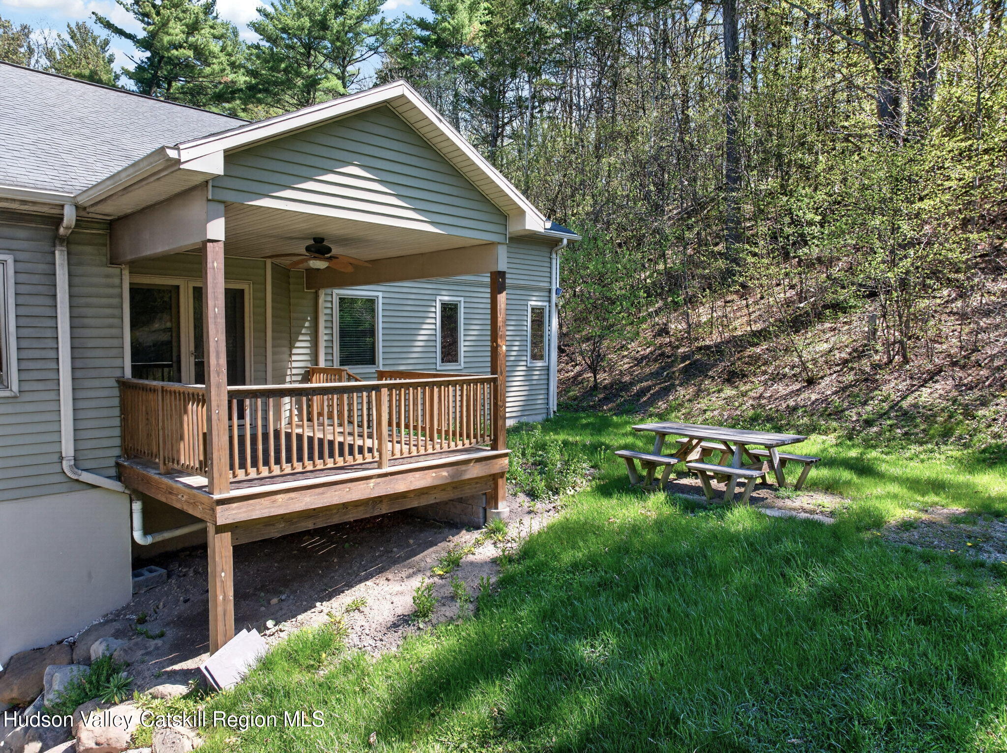 86 Paul Horn Road Catskill, NY 12414 - Photo 48 of 56 a view of a house with a yard and deck