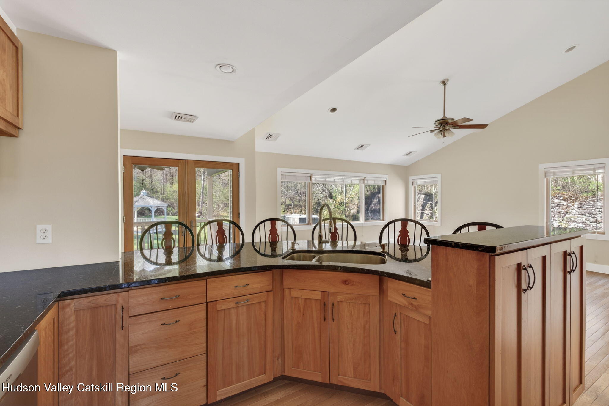 86 Paul Horn Road Catskill, NY 12414 - Photo 8 of 56 a kitchen with stainless steel appliances granite countertop a sink a stove and cabinets