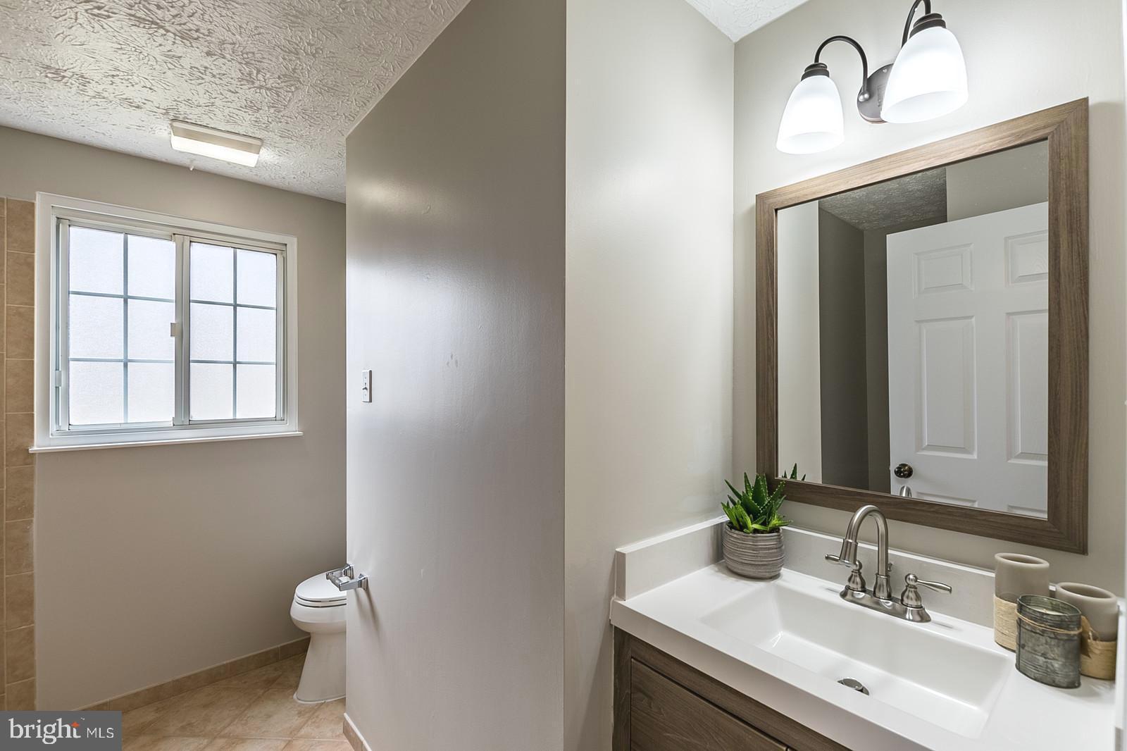 8287 Raindrop Way Springfield, VA 22153 - Photo 27 of 36 Updated hallbath