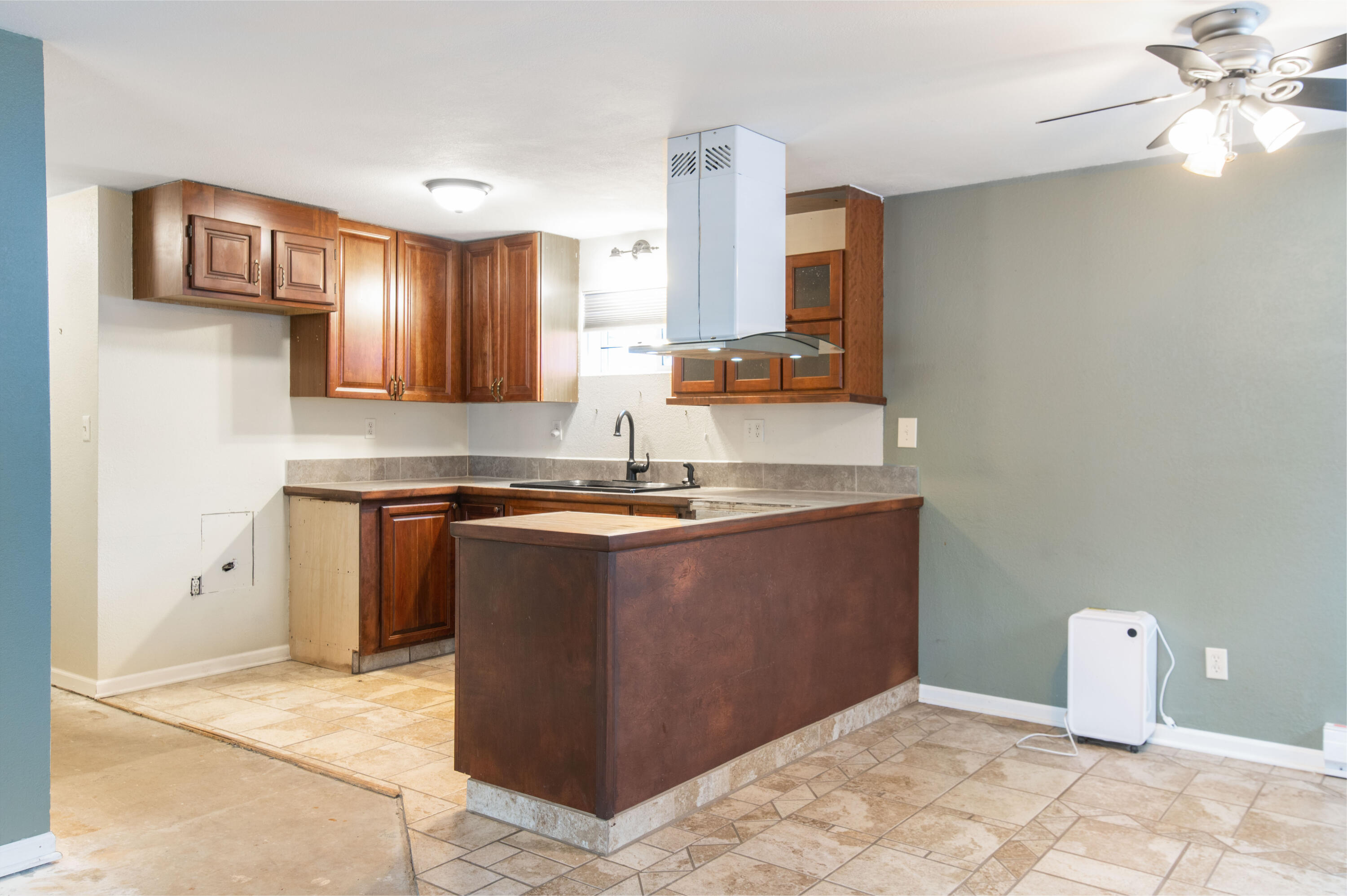 W304-n2426 Maple Avenue Delafield, WI 53072 - Photo 26 of 36 Lower Level Kitchen/Living Room