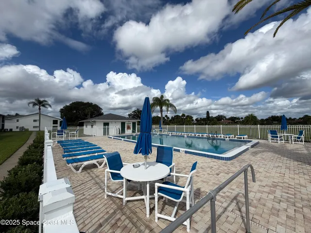 a view of a terrace with sitting area