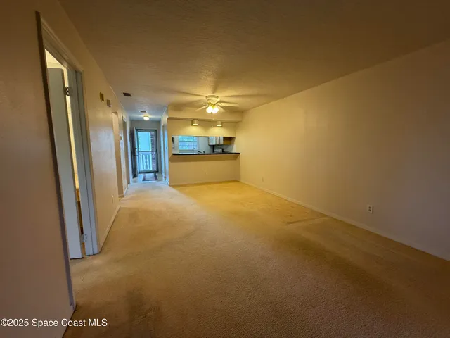 a view of a room with an empty space