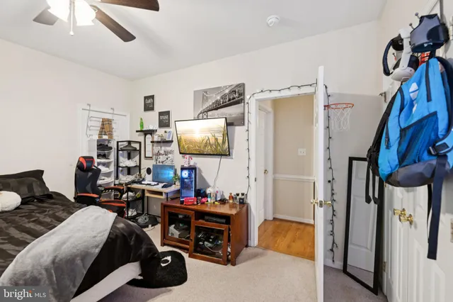 a bedroom with furniture and a bed