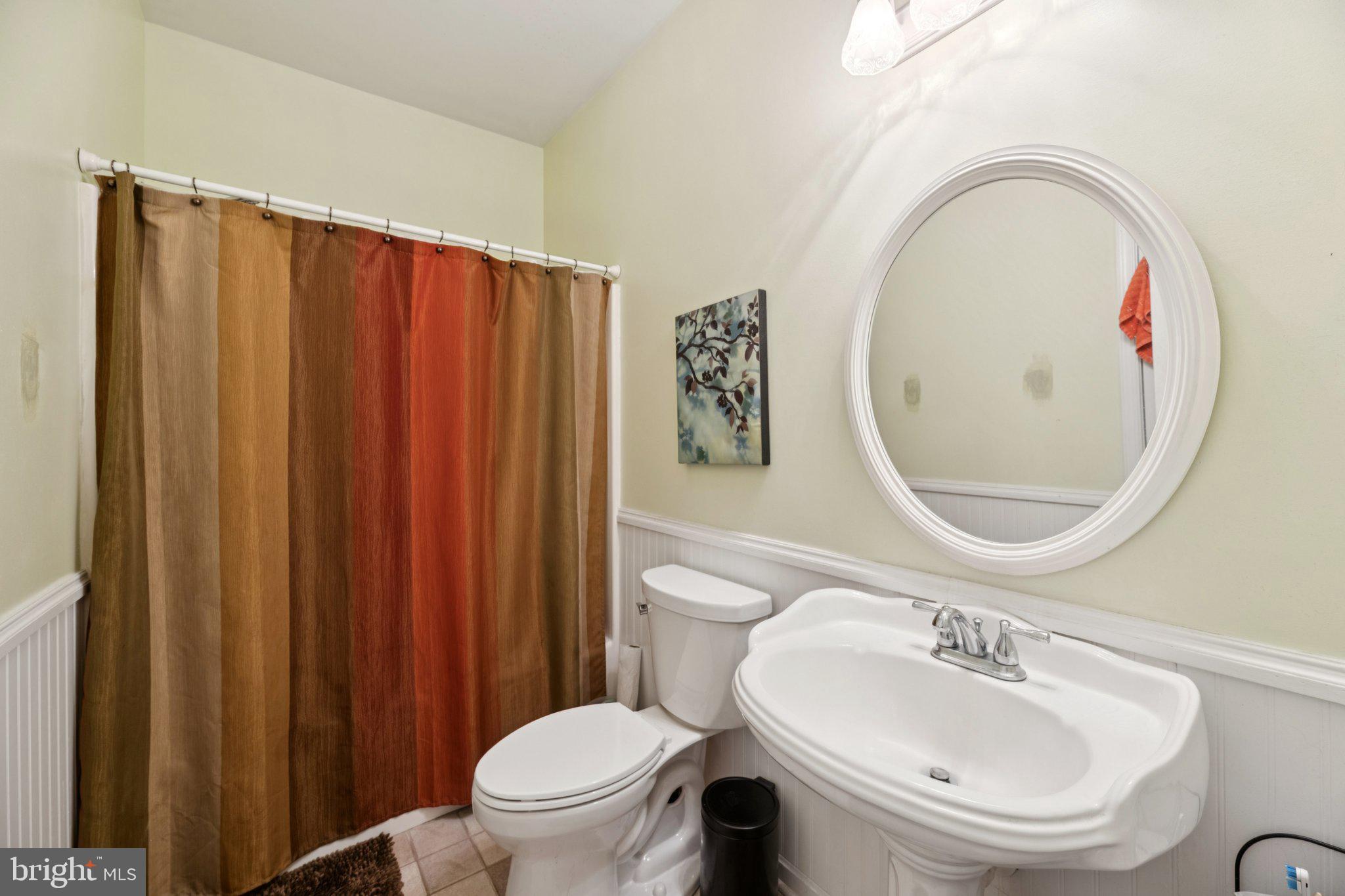 14715 Jennifer Court Issue, MD 20645 - Photo 31 of 43 a bathroom with a sink a toilet and a mirror
