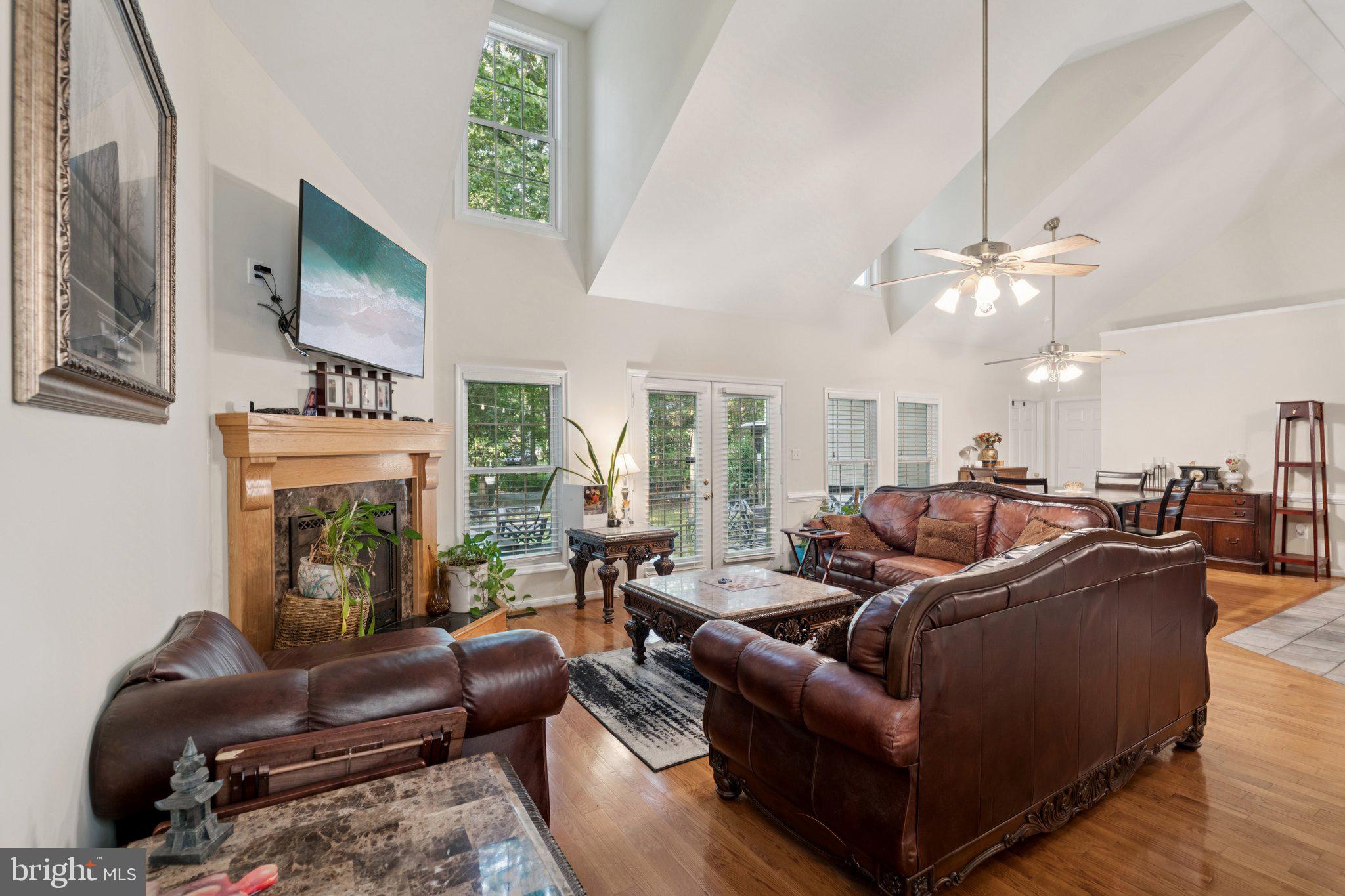 14715 Jennifer Court Issue, MD 20645 - Photo 9 of 43 a living room with furniture and a large window