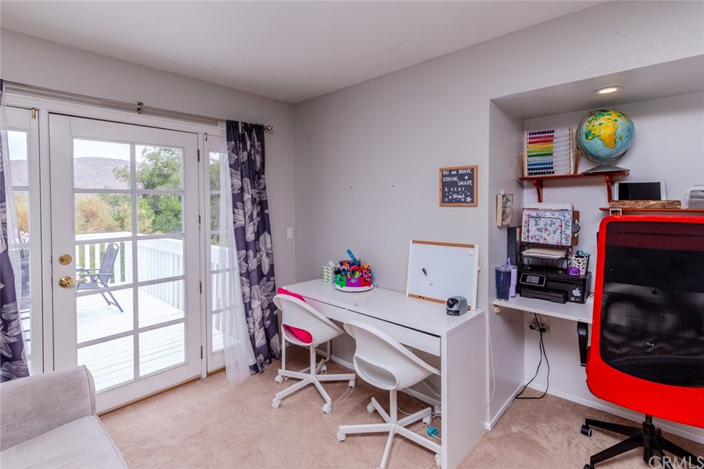 13058 Red Corral Drive Corona, CA 92883 - Photo 16 of 37 a room with furniture and a window