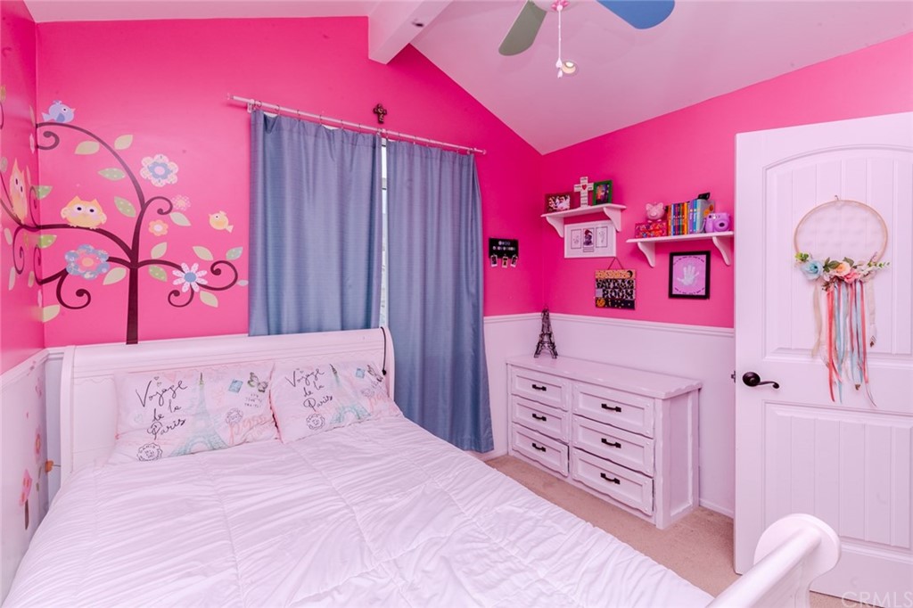 13058 Red Corral Drive Corona, CA 92883 - Photo 22 of 37 a bedroom with a bed and a dresser