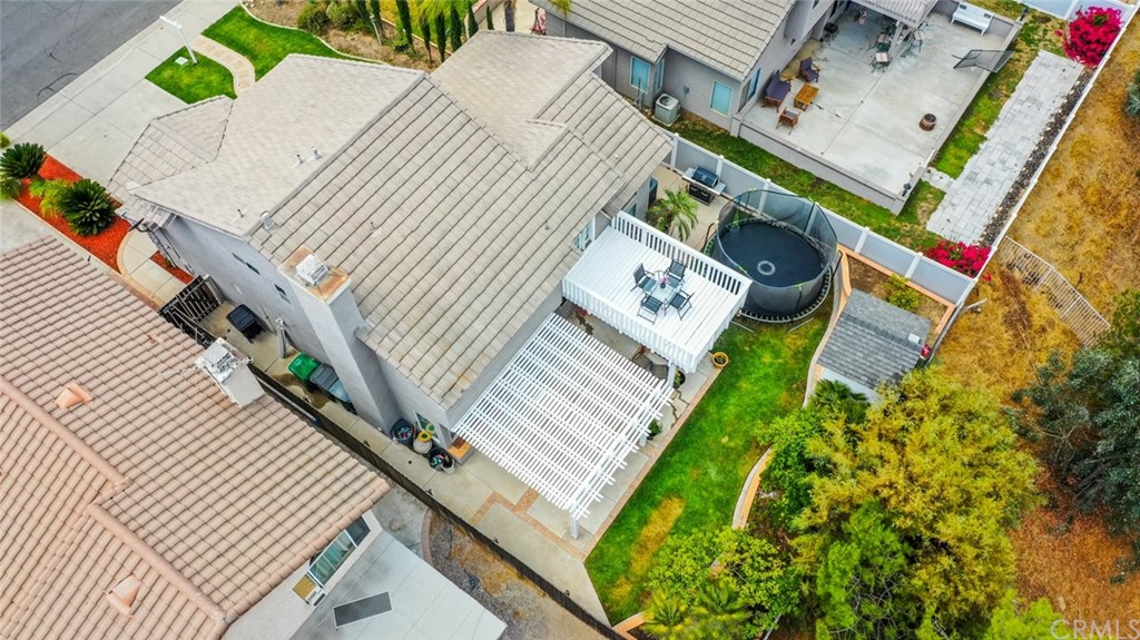 13058 Red Corral Drive Corona, CA 92883 - Photo 35 of 37 a view of a backyard with sitting area