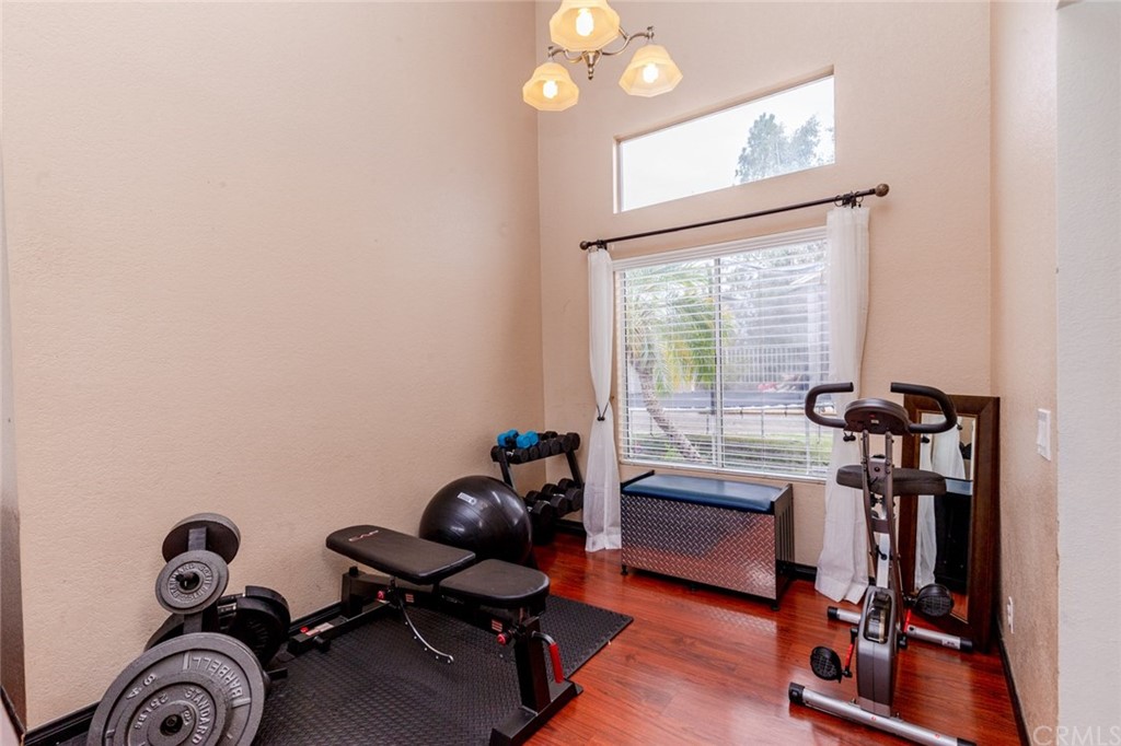 13058 Red Corral Drive Corona, CA 92883 - Photo 9 of 37 a view of a room with gym equipment