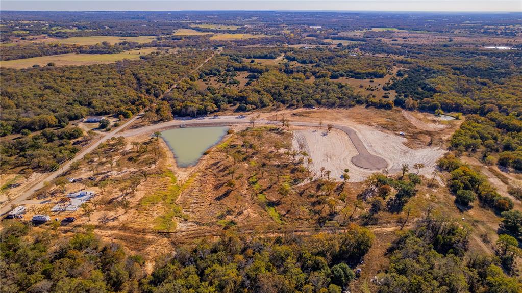 Lot 7 Suade Way Weatherford, TX 76088 - Photo 6 of 18 an aerial view of residential houses with outdoor space