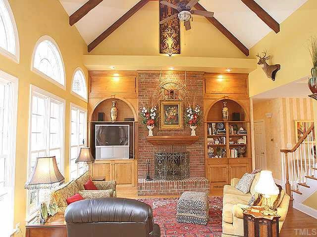 5904 Weather Rock Court Raleigh, NC 27613 - Photo 3 of 8 Refined Rustic Great Room with Masonry Fireplace,exposed wood beams,Custom designed Wood Built-Ins, Surround Sound,Opens to kitchen Other