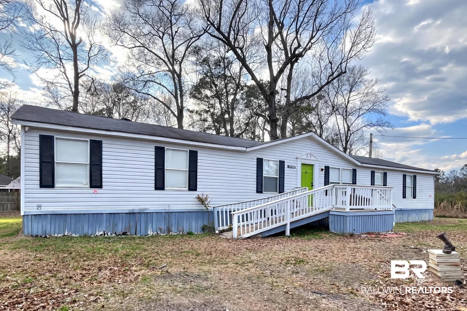 9628 Bryant's Lndg Road Stockton, AL 36579 - Photo 2 of 7 Manufactured / mobile home with a wooden deck