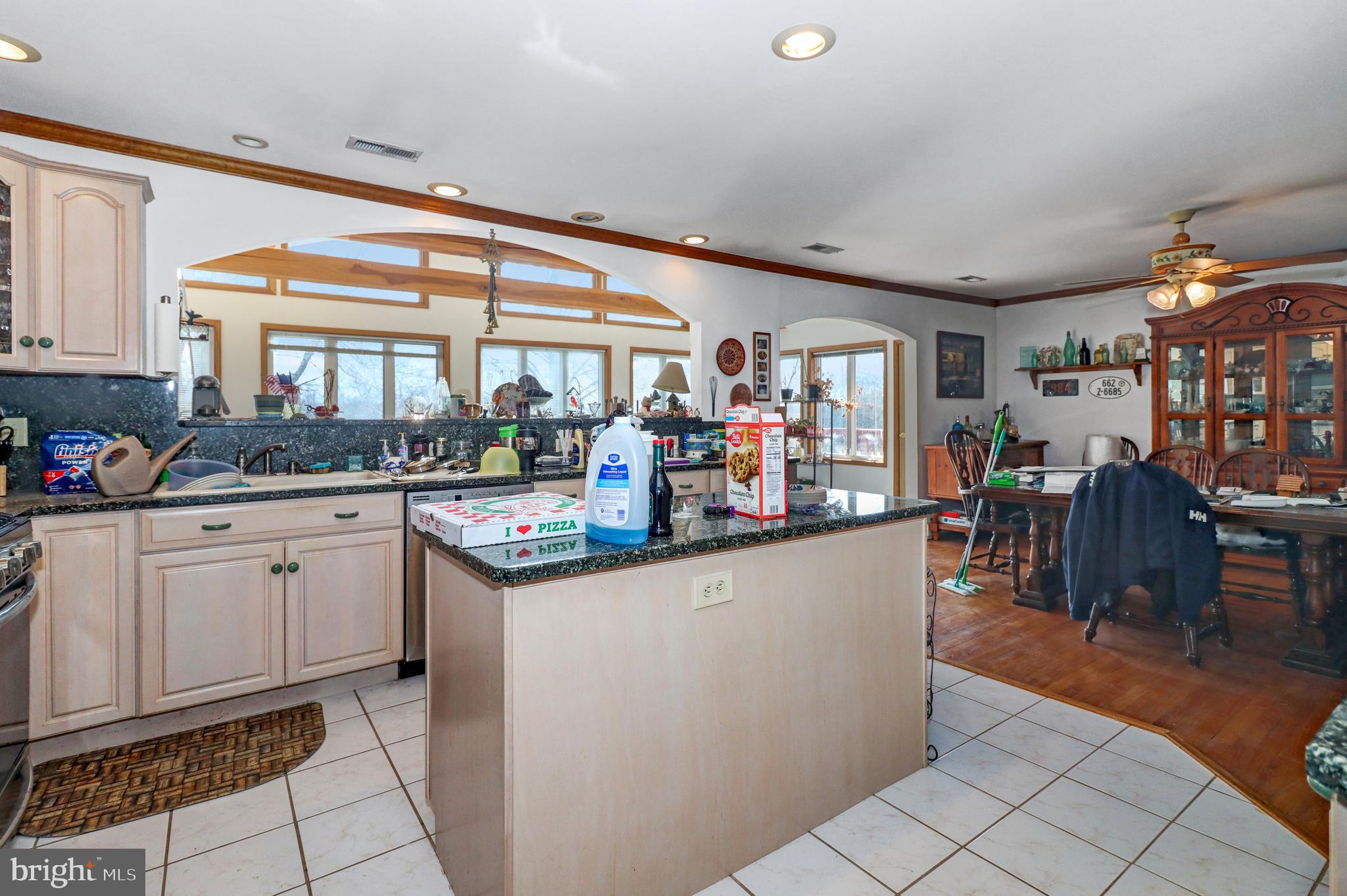 170-174 West Millstream Road Cream Ridge, NJ 08514 - Photo 35 of 109 a kitchen with stainless steel appliances granite countertop a refrigerator and a stove