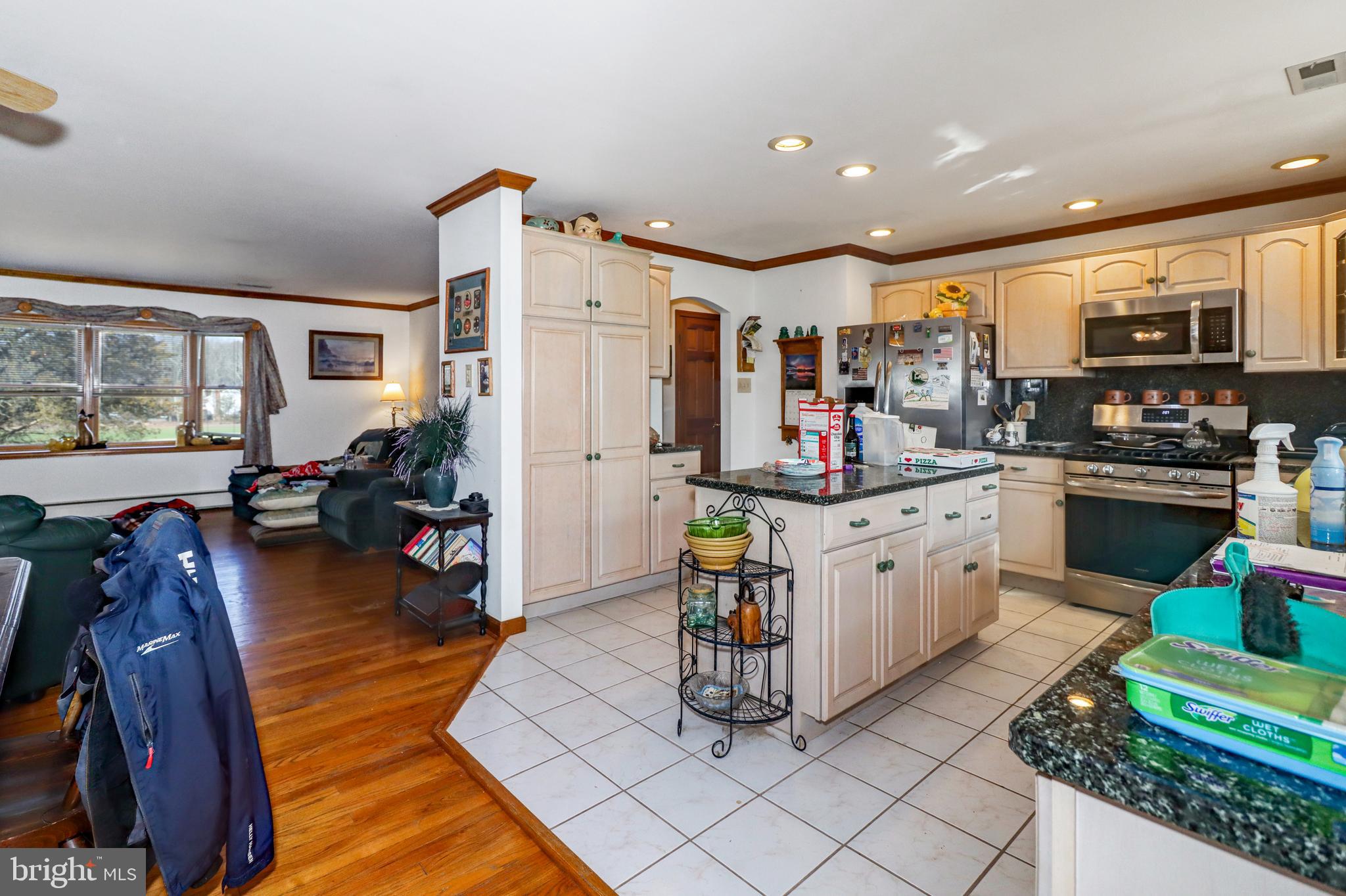 170-174 West Millstream Road Cream Ridge, NJ 08514 - Photo 36 of 109 a kitchen with stainless steel appliances kitchen island granite countertop a sink and cabinets