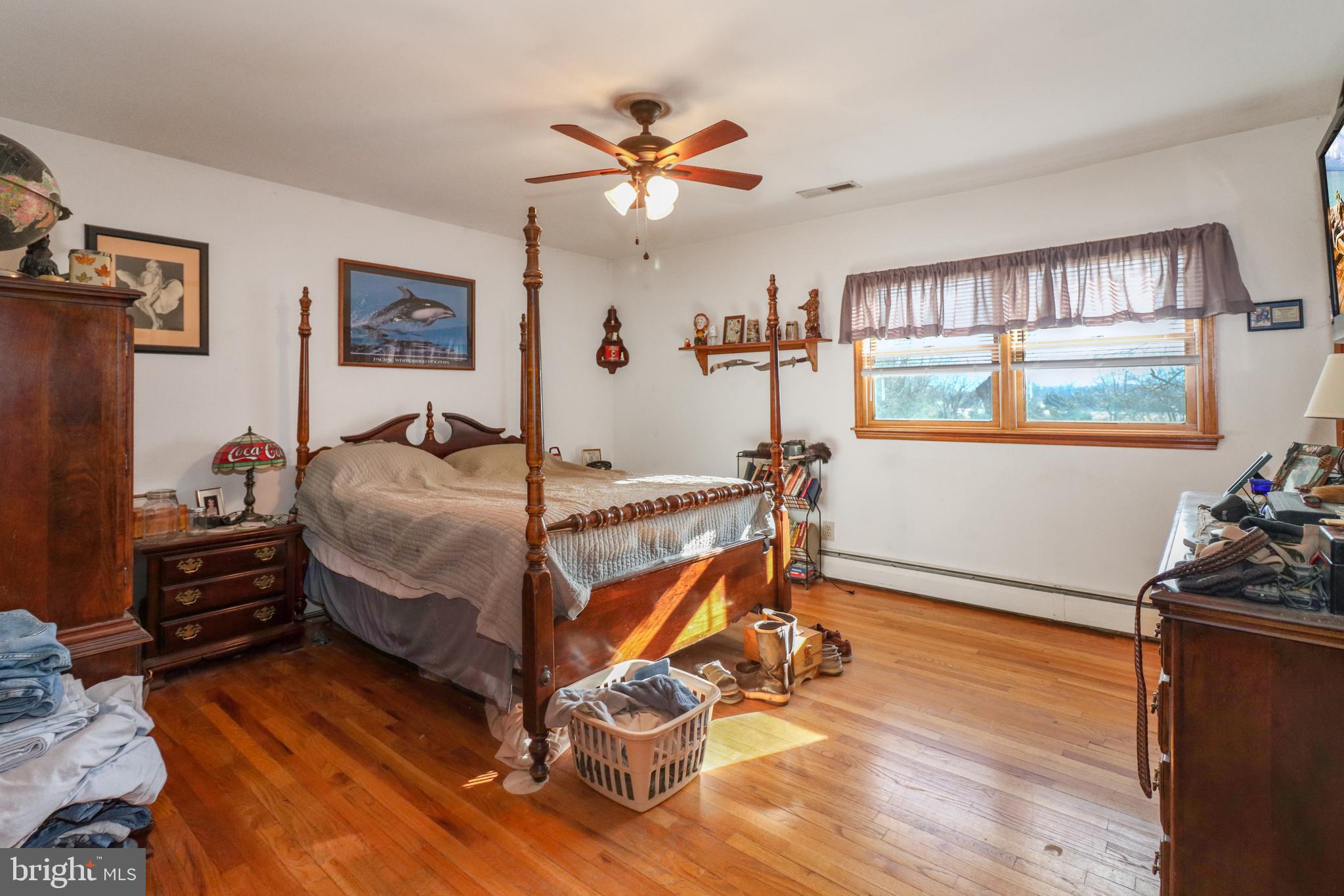 170-174 West Millstream Road Cream Ridge, NJ 08514 - Photo 37 of 109 a bedroom with a bed and a window