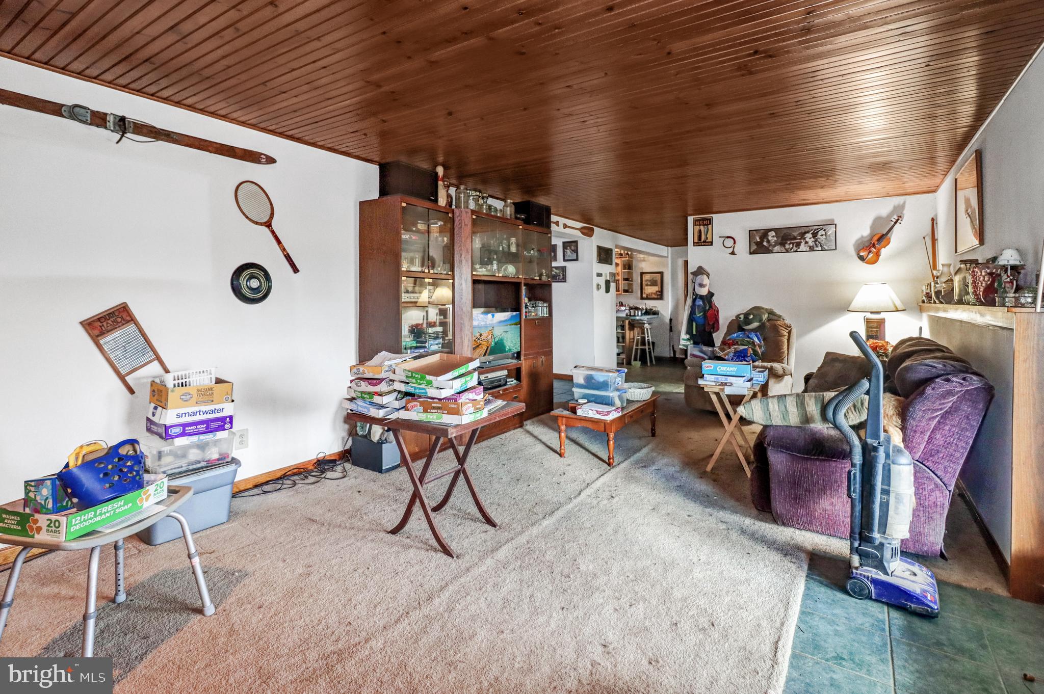 170-174 West Millstream Road Cream Ridge, NJ 08514 - Photo 50 of 109 a living room with furniture a rug and a table