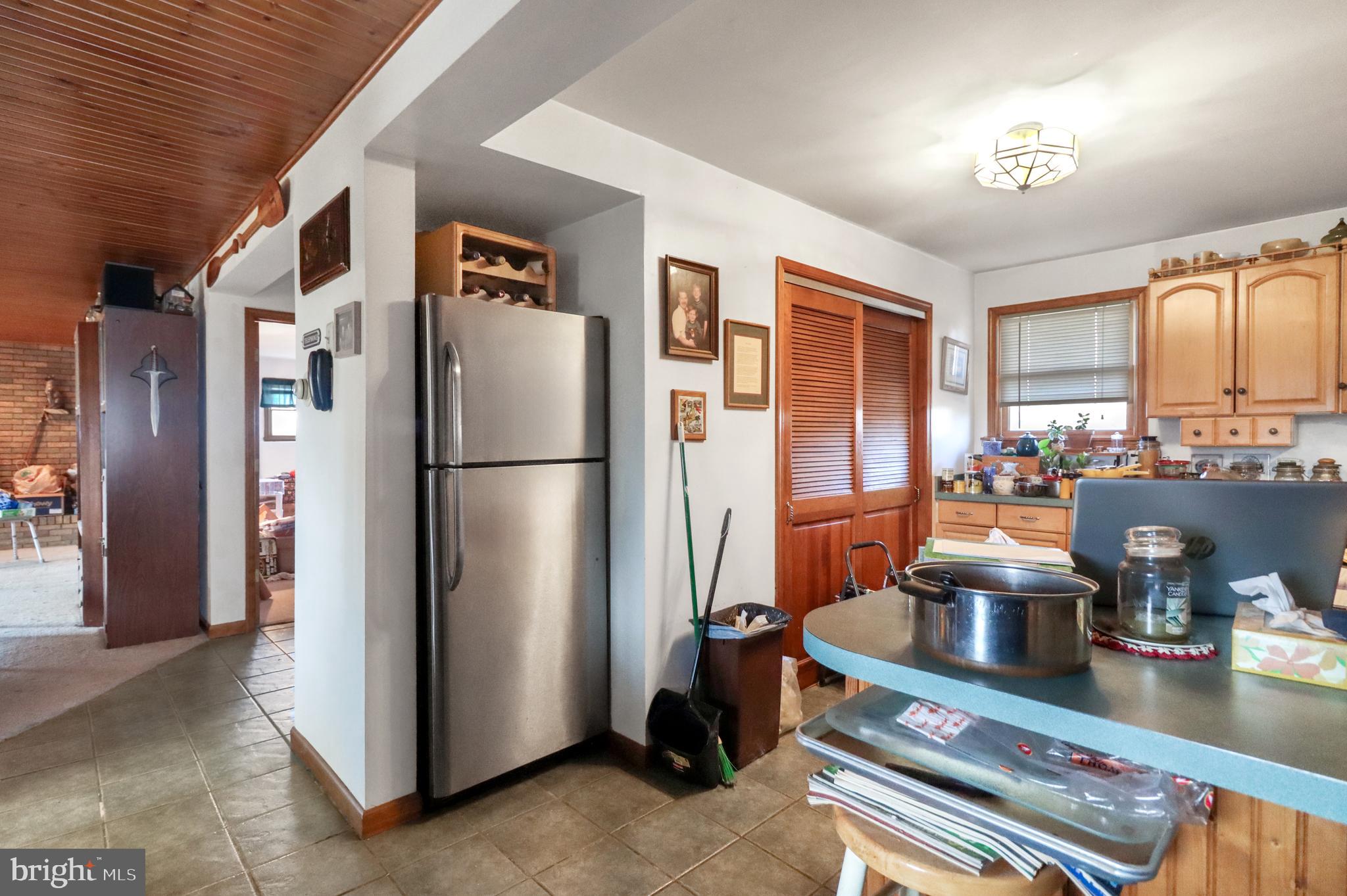 170-174 West Millstream Road Cream Ridge, NJ 08514 - Photo 54 of 109 a kitchen with stainless steel appliances granite countertop a refrigerator and a stove
