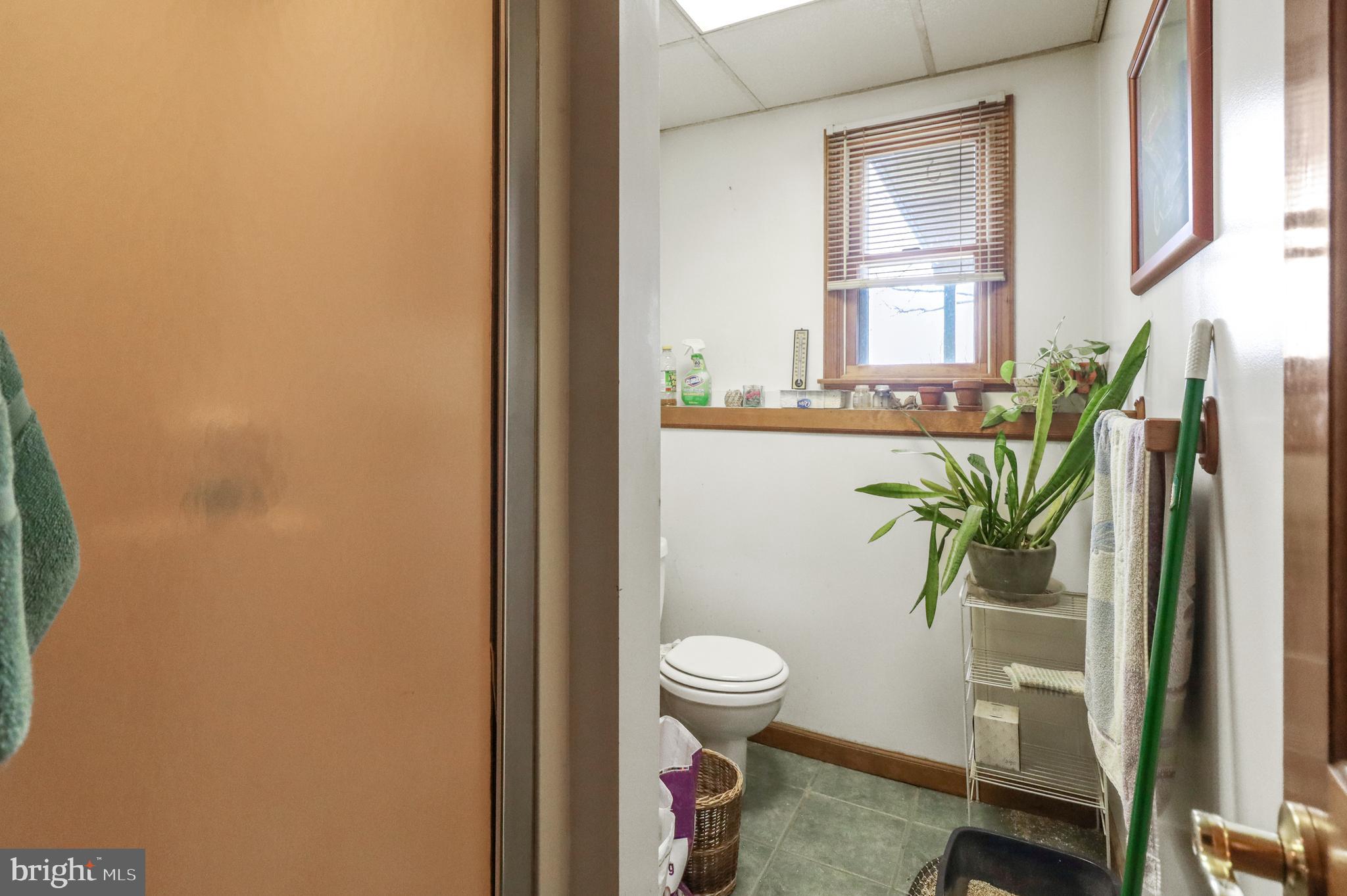 170-174 West Millstream Road Cream Ridge, NJ 08514 - Photo 60 of 109 a bathroom with a sink a toilet and a shower